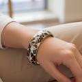 Aisha Mother of Pearl Kada - Handcrafted Black &amp; Grey Shell Bangle with Gold-Tone Metal